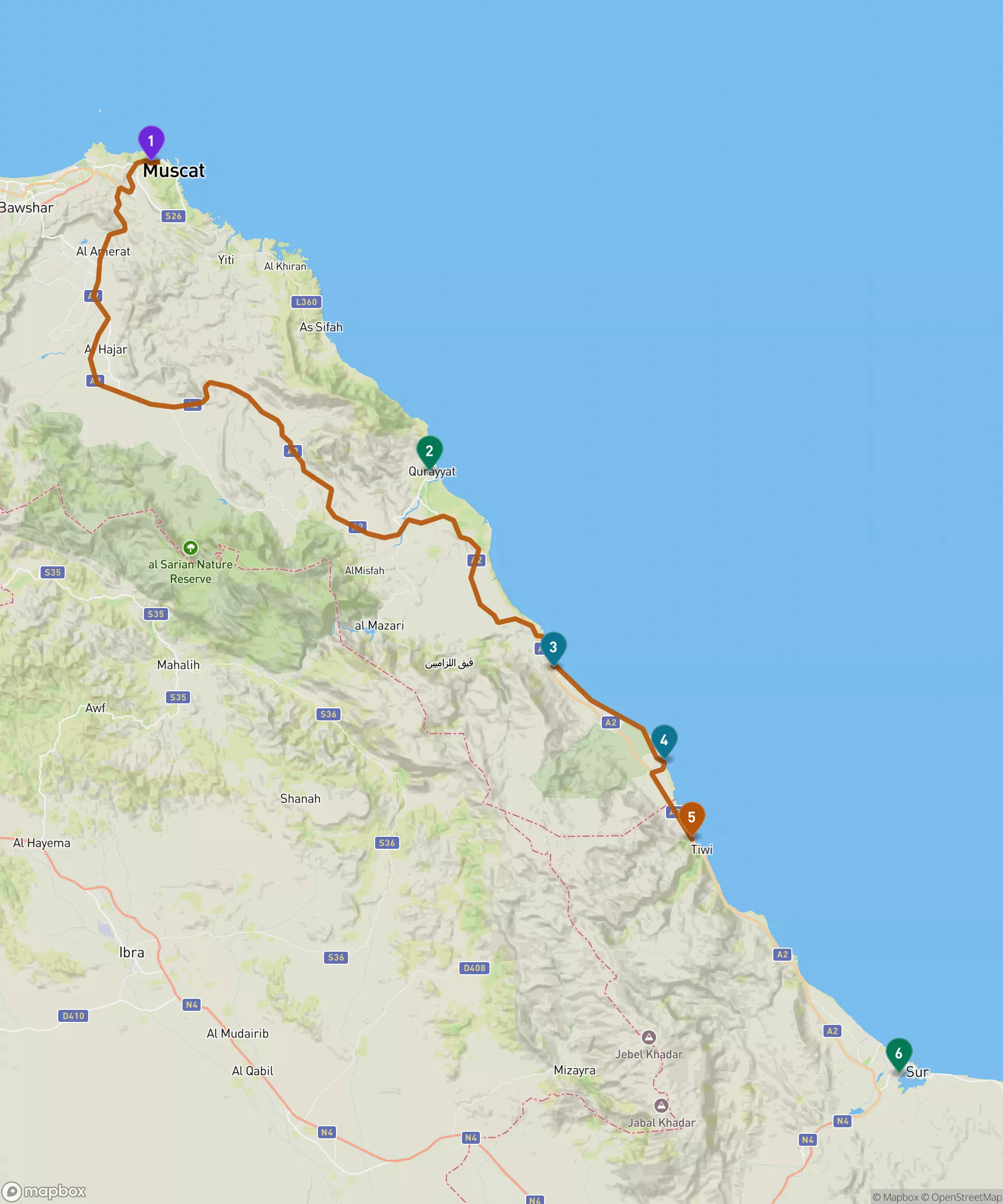 Map of the coast southeast of Muscat, Oman. An orange driving route leaves Muscat, marked 1, heads inland through the mountains, meets the sea near Qurayyat, marked 2, then follows the shoreline south past Bimmah Sinkhole, marked 3, Fins Beach, marked 4, and the Wadi Shab parking area at Tiwi, marked 5, continuing toward Sur, marked 6.
