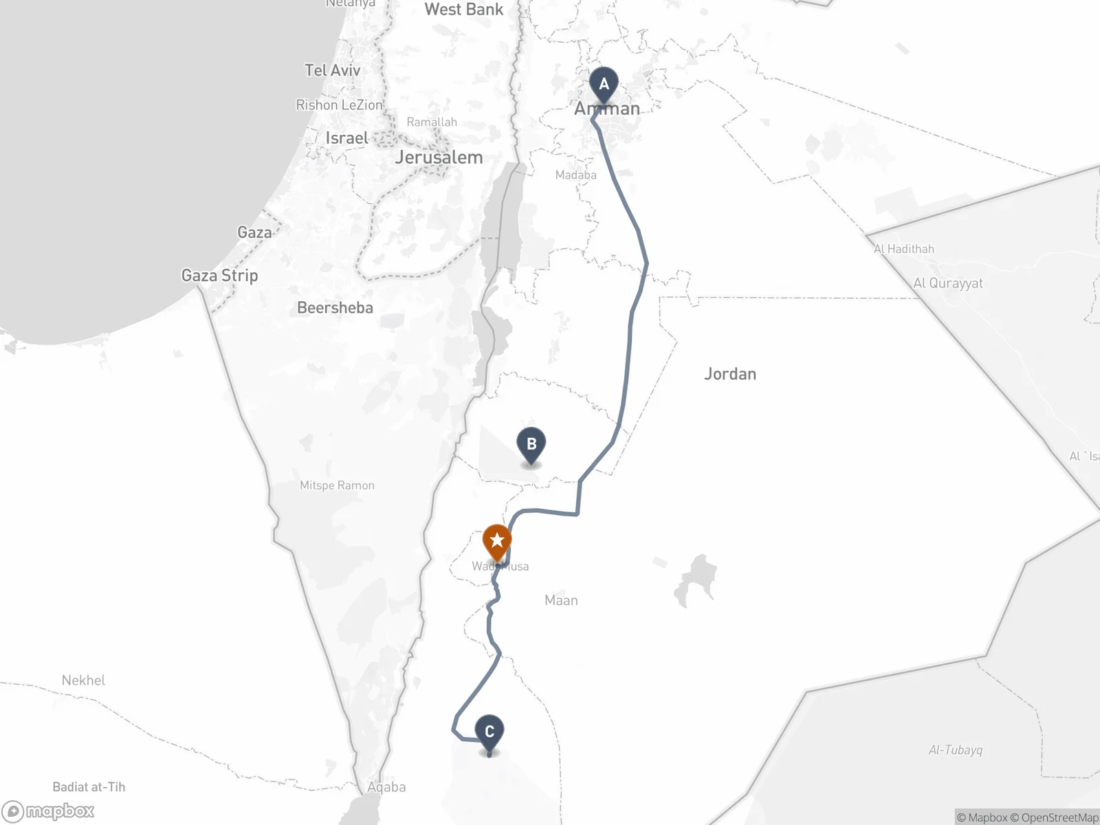 Locator map of southern Jordan showing Amman in the north, the Dana Biosphere Reserve, Wadi Musa and Petra marked with a star, and Wadi Rum in the south, linked by the Desert Highway corridor.