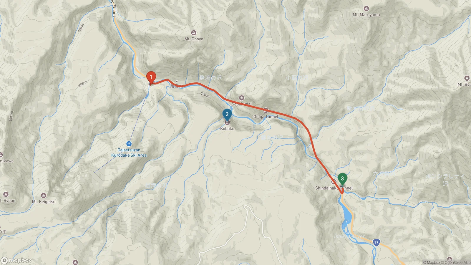 Terrain map of Sounkyo Gorge with three numbered pins along a red road line running east: 1 Sounkyo Onsen village, 2 the Ginga and Ryusei waterfalls viewing area about three kilometres up the valley, and 3 the Obako rock formation about seven kilometres from the village.
