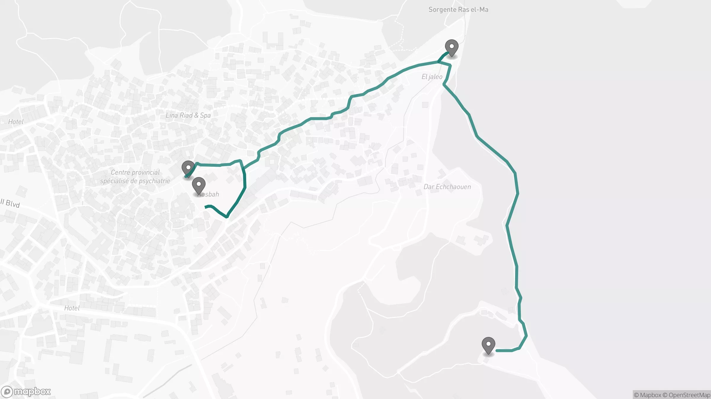 Static walking-route map of Chefchaouen showing Plaza Uta el Hammam, Kasbah Chefchaouen, Ras El Ma, and the Spanish Mosque viewpoint.